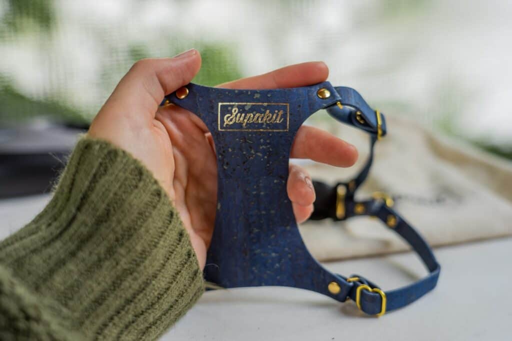 woman's handing holding Supakit Cat Harness
